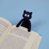 Boekenlampje kat