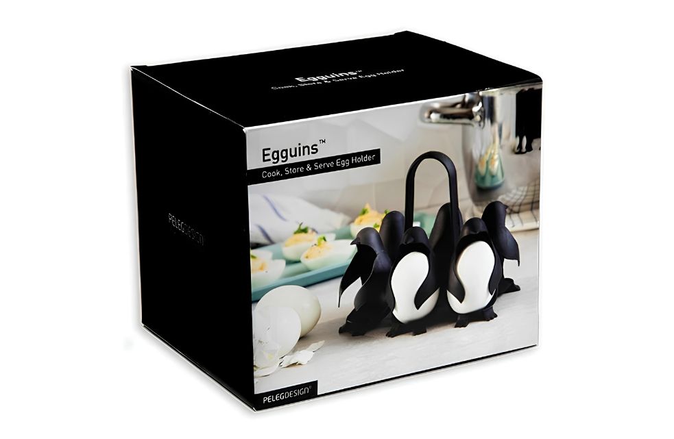 Originele verpakking van de Egguins eierhouder van Peleg Design met afbeelding van de pinguïns