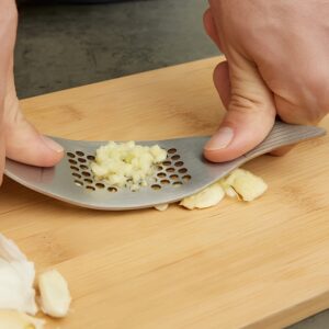 Fish garlic press