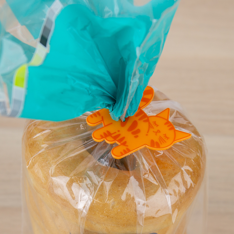 Oranje Cat Butt Bag Tie sluitclip om een geopende zak